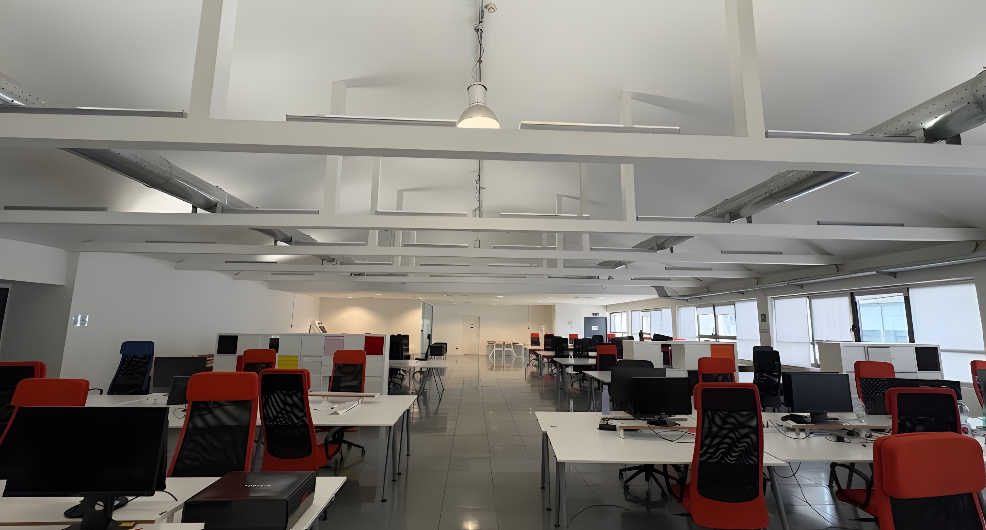 Open-plan floor with exposed beams