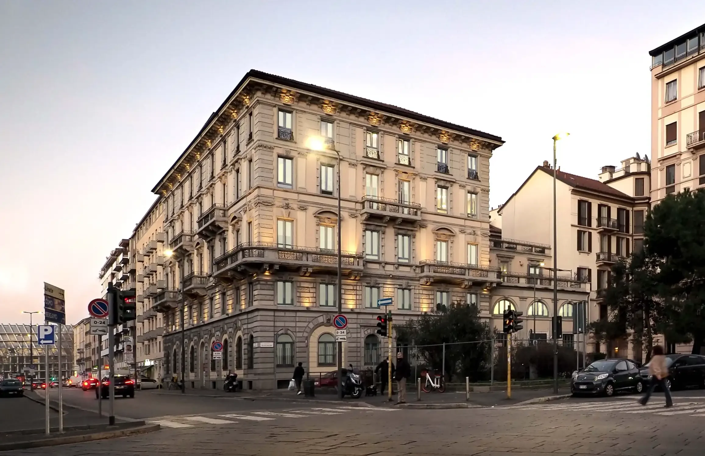 Corner building with an ornate stone façade