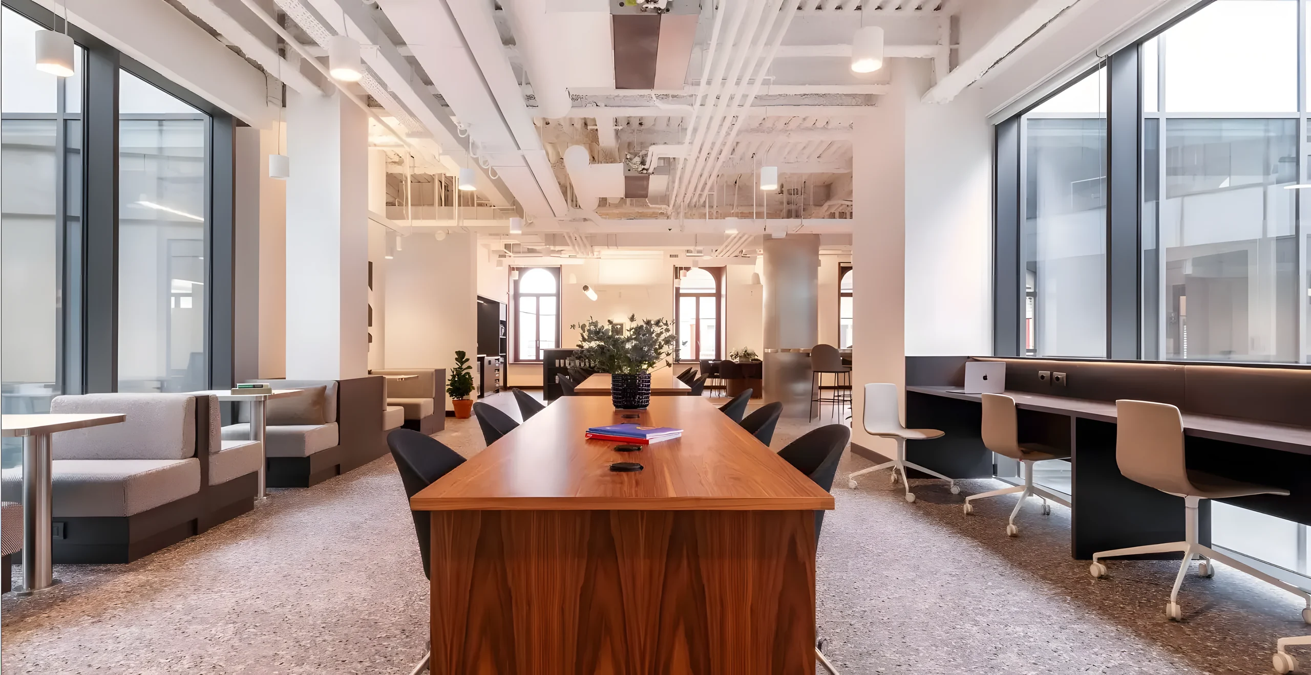 Coworking area with a long walnut table