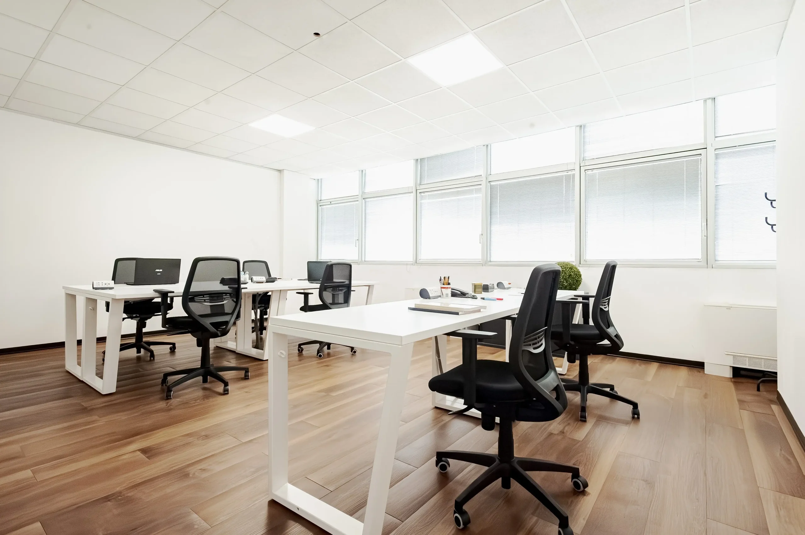 Private office with windows along one wall