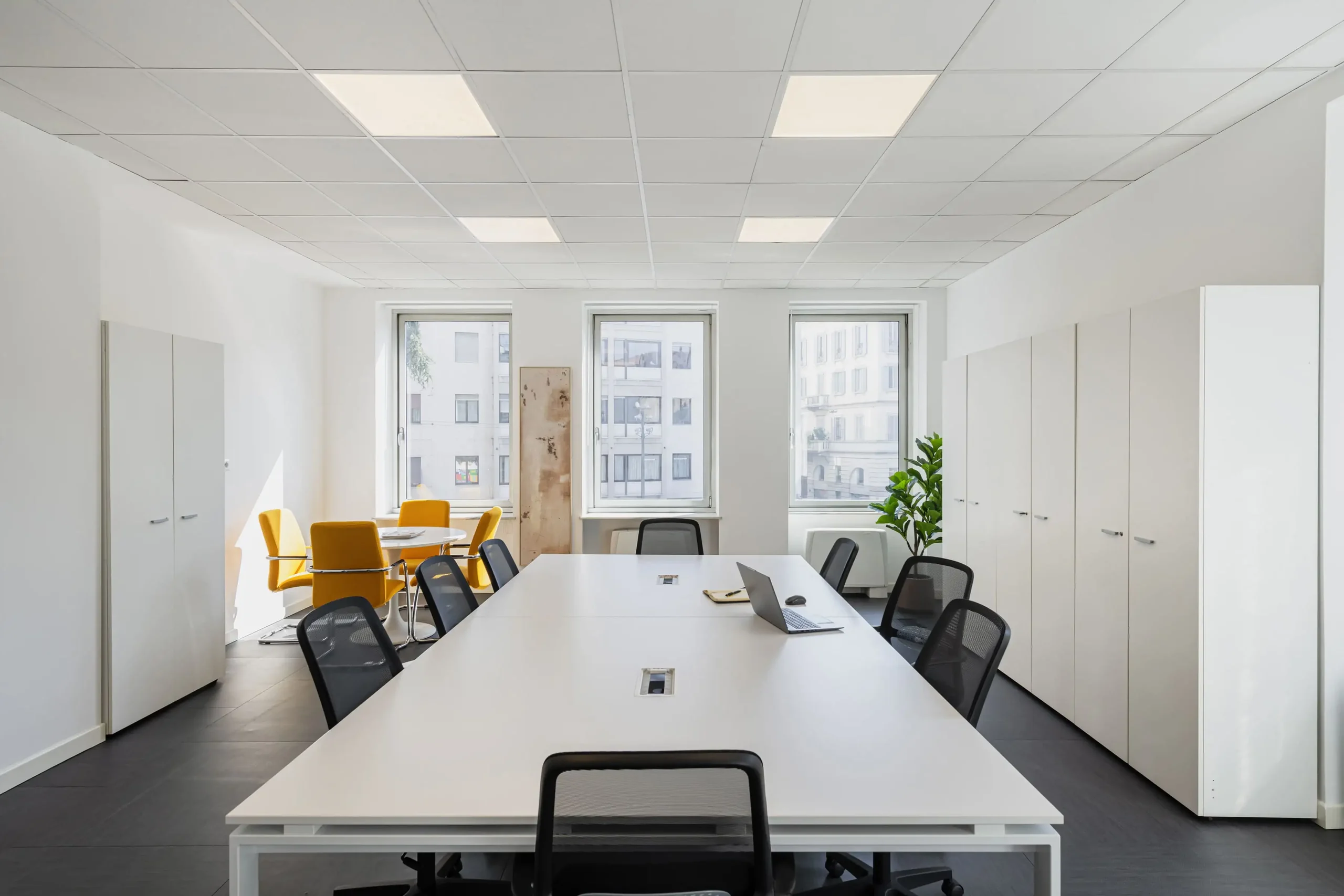 Large office with a long shared desk