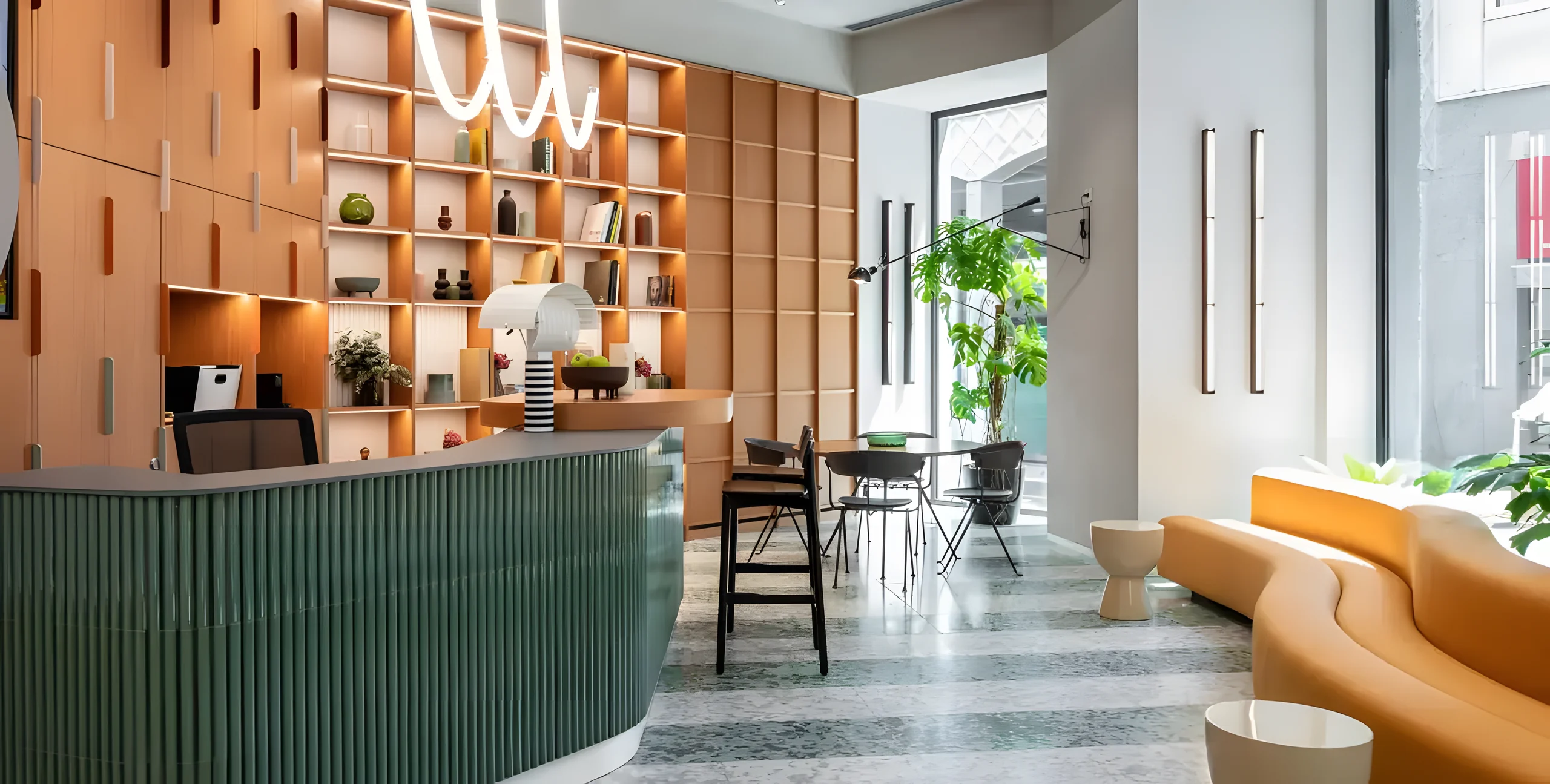 Reception and lounge with a curved sofa